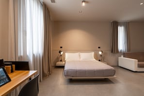 Junior Quadruple Room | Living area