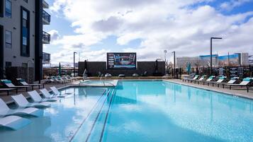 Seasonal outdoor pool, pool loungers