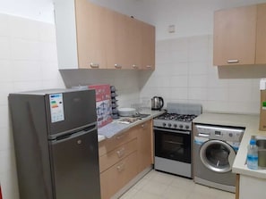 Fridge, microwave, oven, stovetop