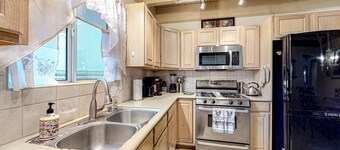 Dog-friendly rural home with deck, wood fireplace, fast WiFi, patio & gas grill