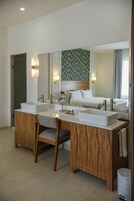 Premium bedding, down comforters, Select Comfort beds, minibar