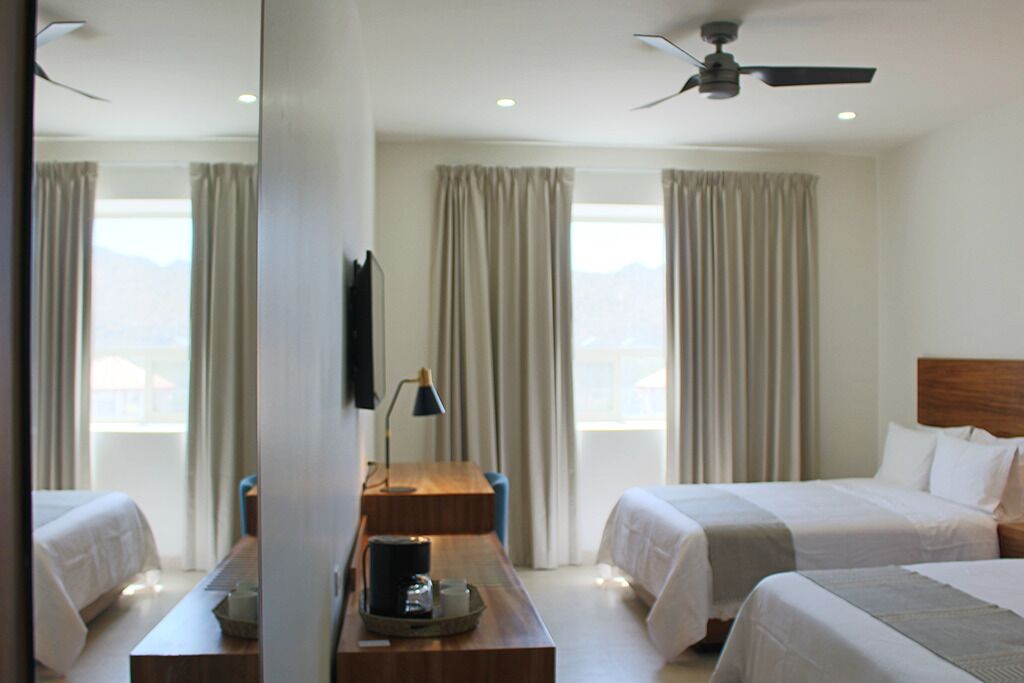 Premium bedding, down comforters, Select Comfort beds, minibar