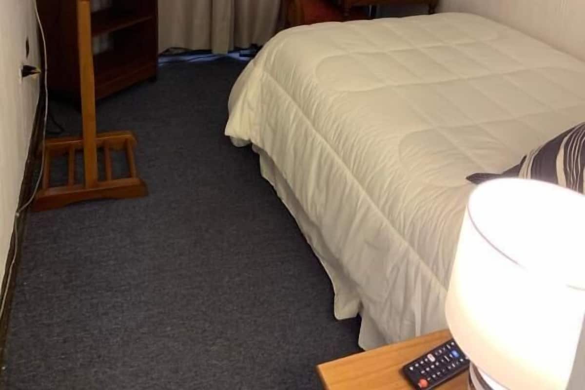 Deluxe Single Room | Premium bedding, desk, laptop workspace, iron/ironing board