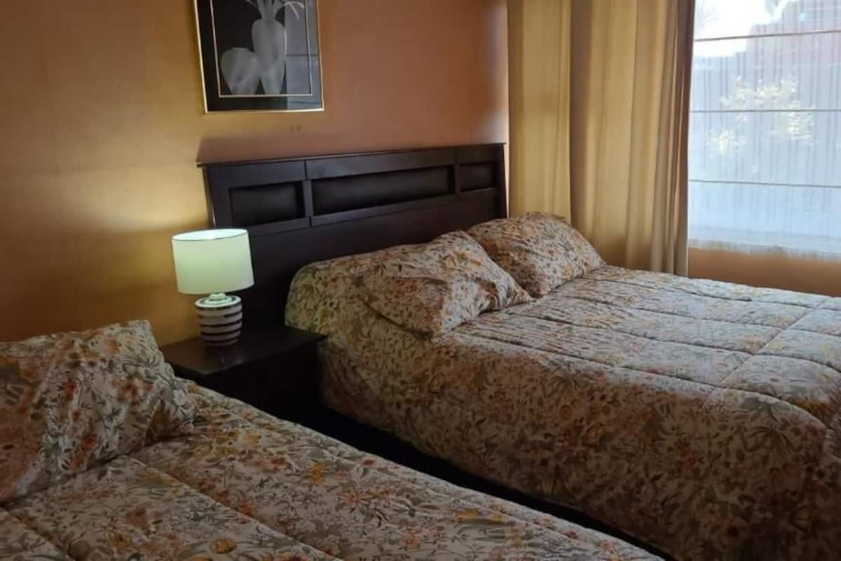 Family Studio Suite | Premium bedding, desk, laptop workspace, iron/ironing board