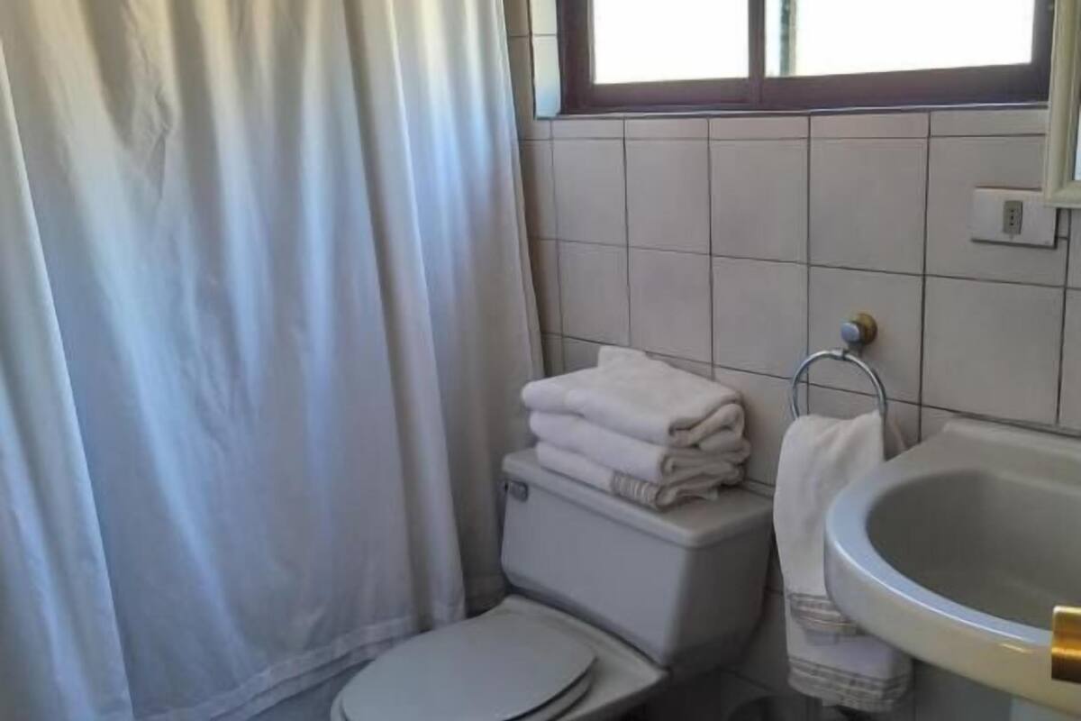 family apartment | bathroom | combined shower/bathtub, free toiletries, hair dryer, towels
