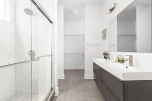 Combined shower/tub, hair dryer, towels, soap