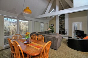 Flat-screen TV, fireplace, table tennis