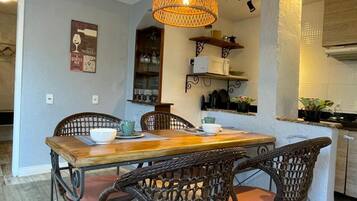 Premium Apartment, Patio, Garden View | Dining room