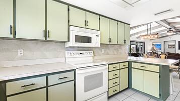 House, Multiple Beds, Pool Access, Pool View | Private kitchen | Fridge, microwave, oven, stovetop