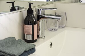 Shower, bathrobes, towels