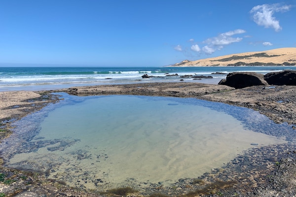 Beach nearby, sun loungers