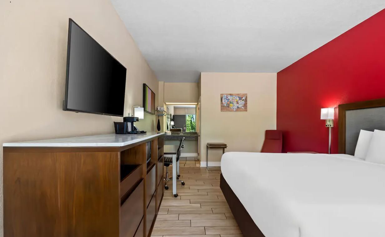 Premium bedding, desk, laptop workspace, soundproofing