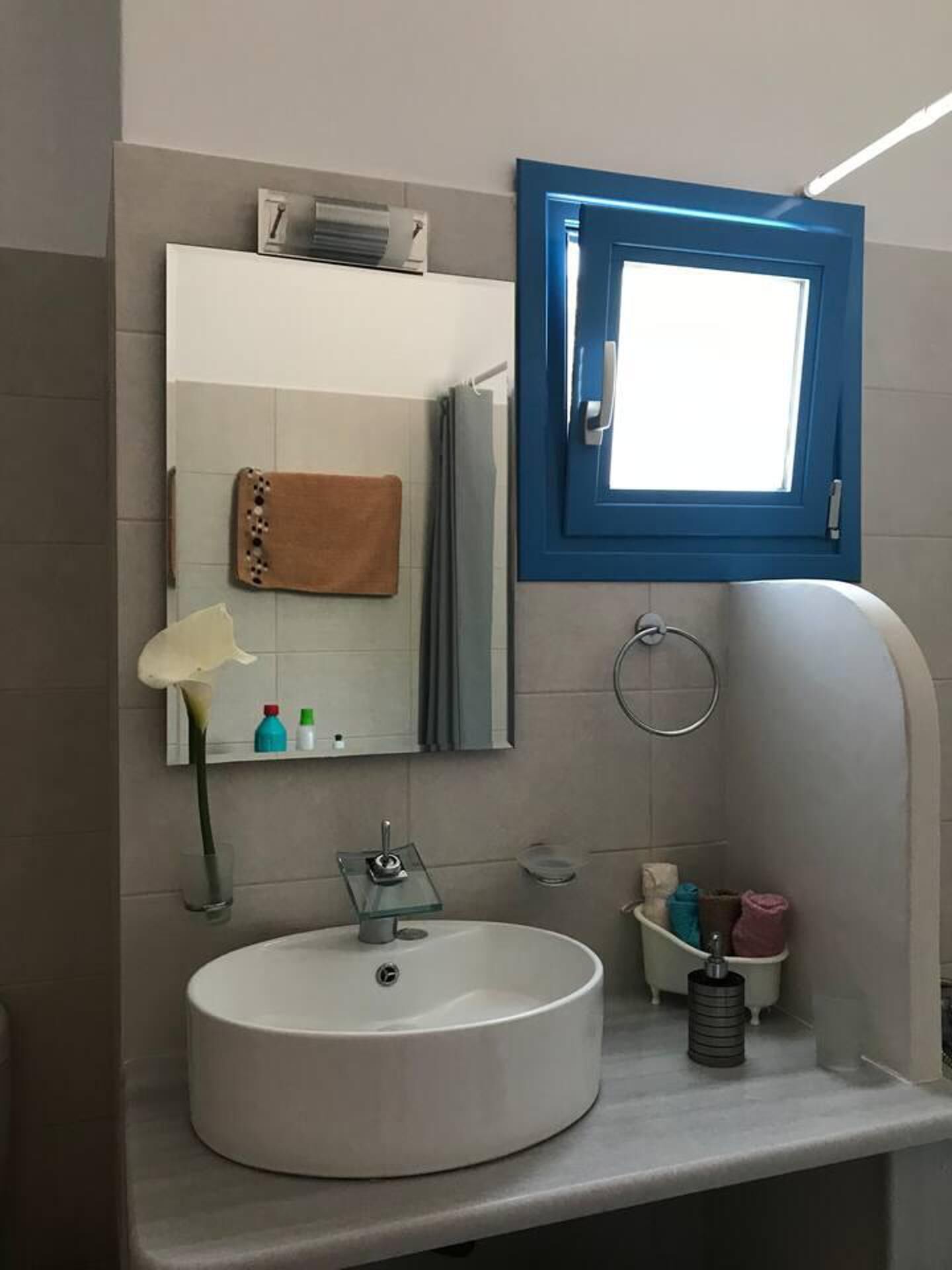 Combined shower/bathtub, deep-soaking bathtub, towels, soap