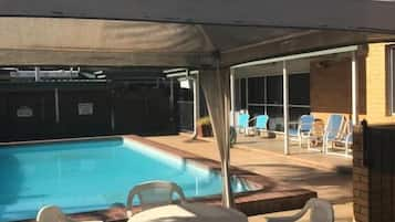 Seasonal outdoor pool, pool umbrellas