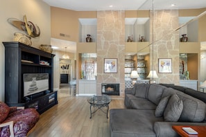 Smart TV, fireplace, books