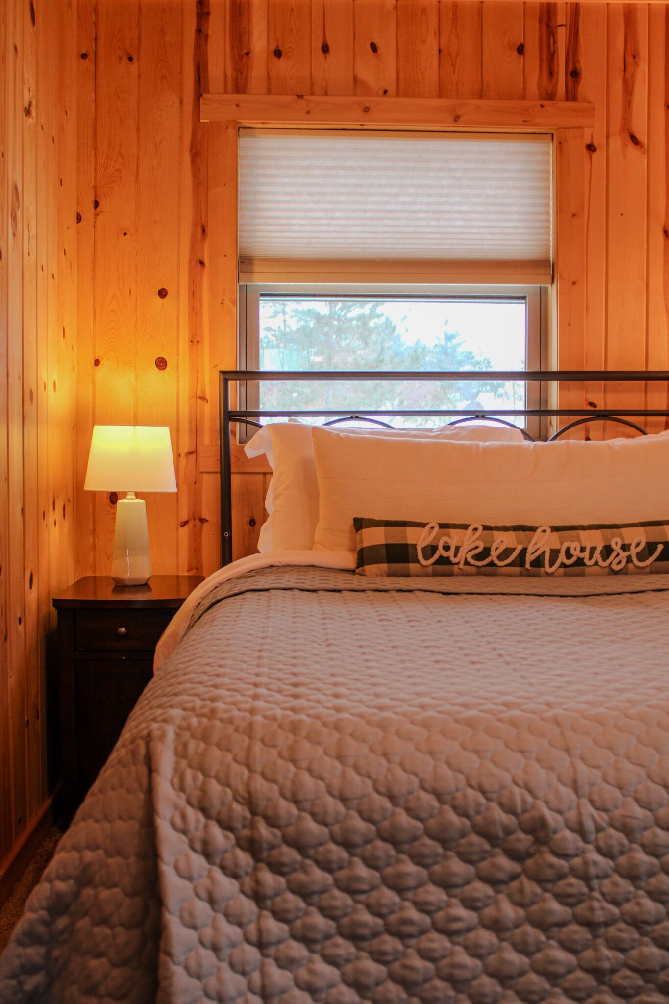 Main cabin guest room with TV and shelving for your bags.