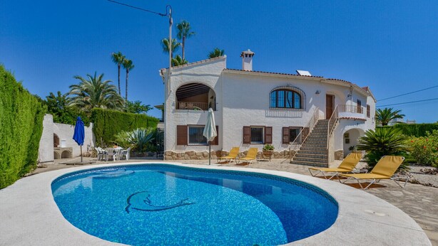A two-story villa with a swimming pool, outdoor seating, and a staircase leading to the upper floor. - JUNAI, villa for 4 pax in Benissa with private swimming pool and free wifi (Benissa)
