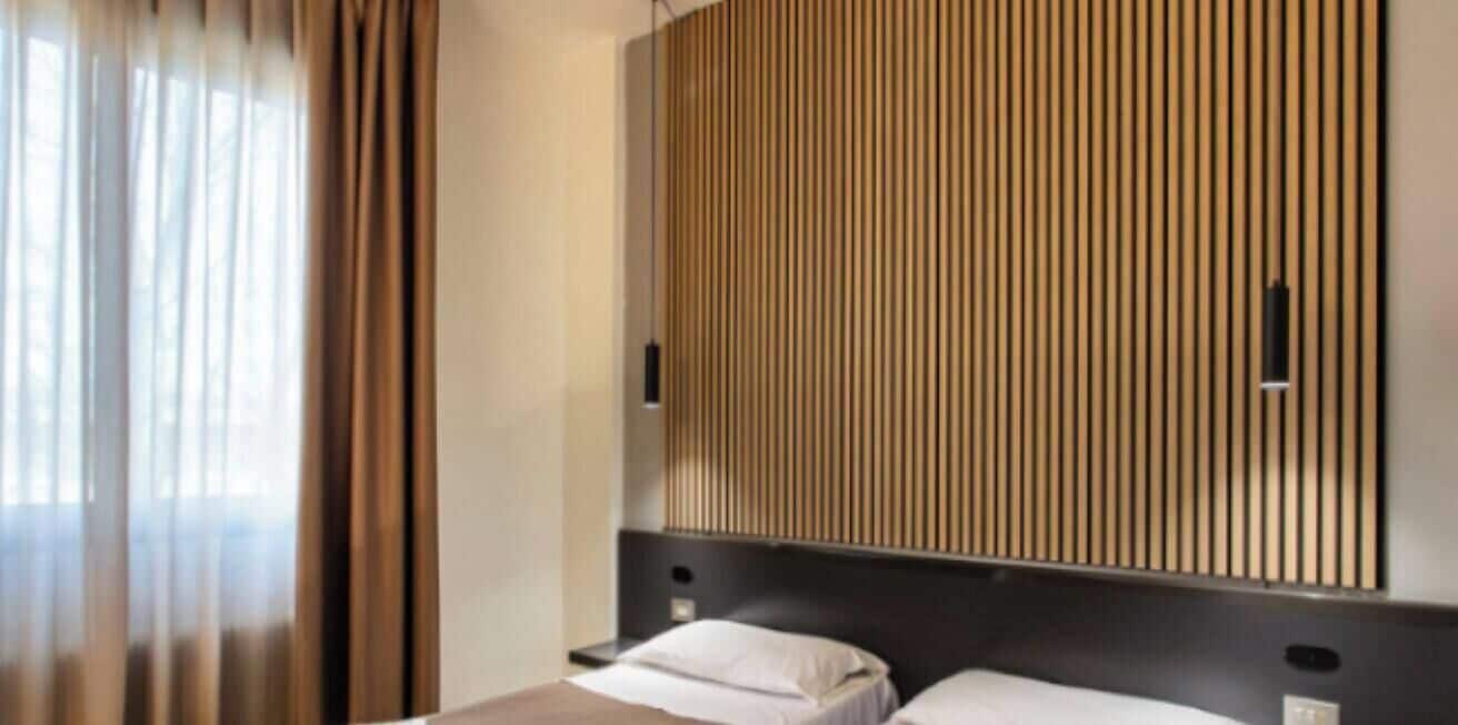 Basic Twin Room | Minibar, desk, laptop workspace, iron/ironing board (on request)