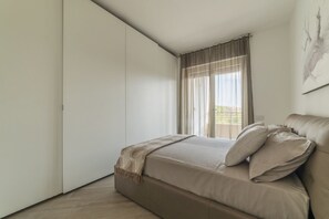 1 slaapkamer, een strijkplank/strijkijzer, wifi