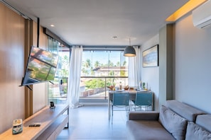 Apartment | Living area | 55-inch Smart TV with digital channels, TV, Netflix