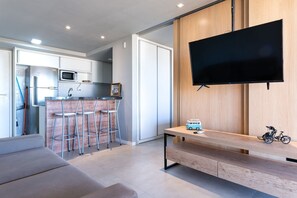 Apartamento | Área de estar | Smart TV 55 polegadas com canais digitais, TV, Netflix