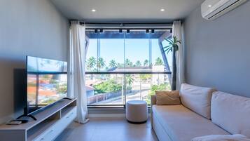 Apartment | Living area | 55-inch Smart TV with digital channels, TV, Netflix