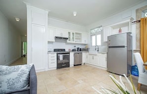 Fridge, microwave, coffee/tea maker, toaster