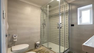 Shower, free toiletries, hair dryer, bathrobes