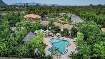 Outdoor pool, open 8:00 AM to 10:00 PM, pool umbrellas, pool loungers