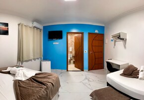 Standard Quadruple Room | Minibar, desk, WiFi (free), bed sheets