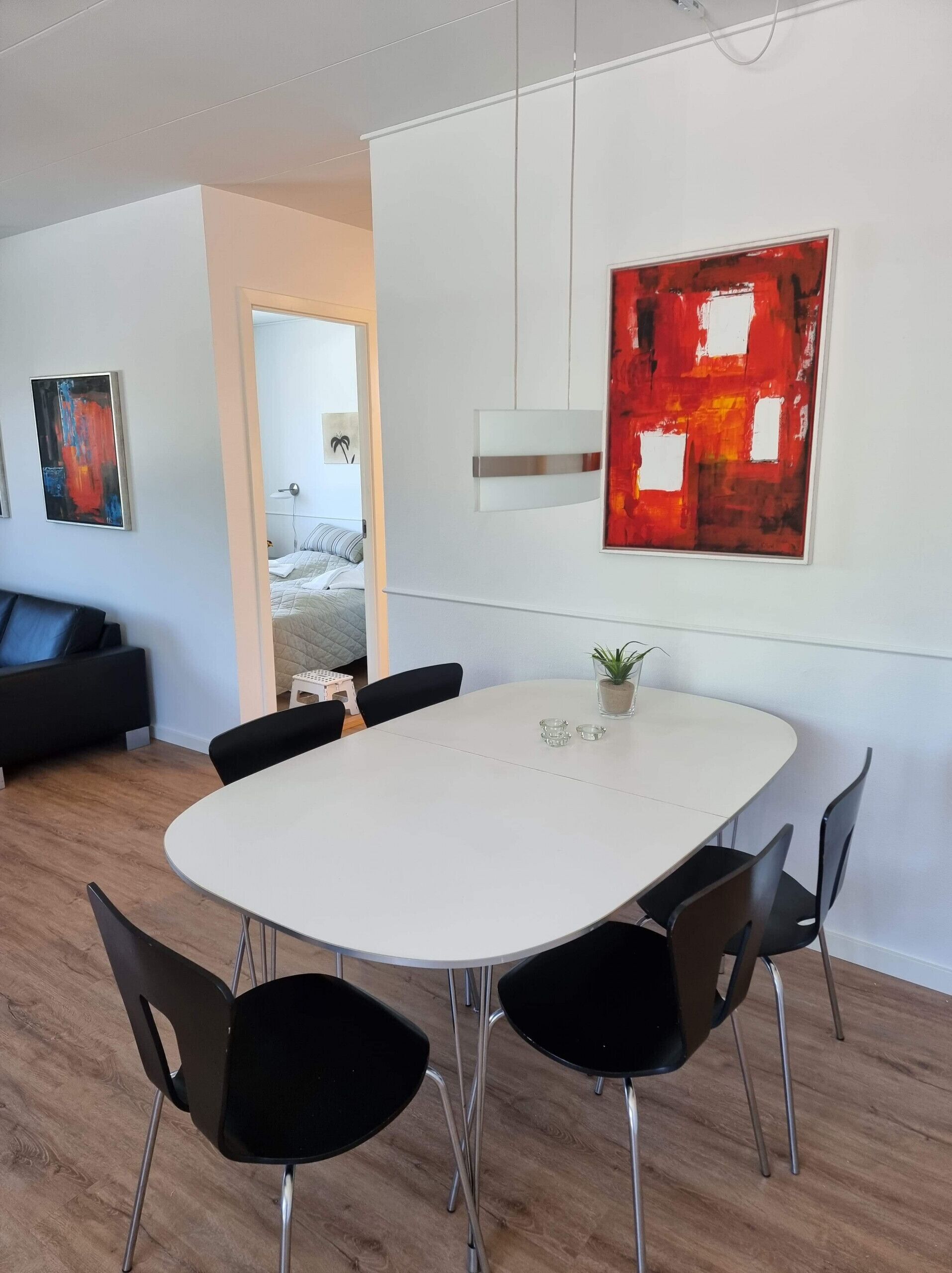 Deluxe Condo | Living area | 50-inch flat-screen TV with cable channels, TV