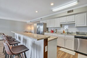 Fridge, microwave, oven, stovetop - Eagle's Nest - Spacious Loft Downtown - Near GSU! (Statesboro)