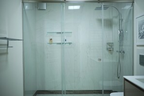 Shower, hair dryer, towels, soap