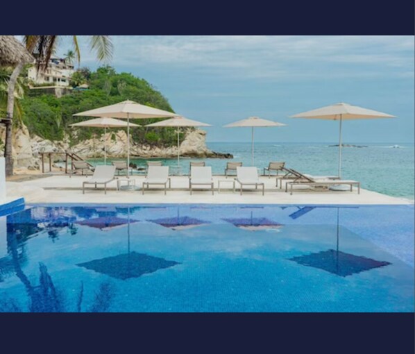 Outdoor pool - Huatulco Camino Real Resort 2-bedroom Condo (Bahias de Huatulco)