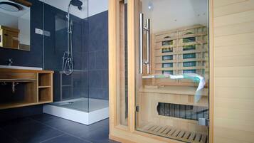 Shower, hair dryer, towels, soap