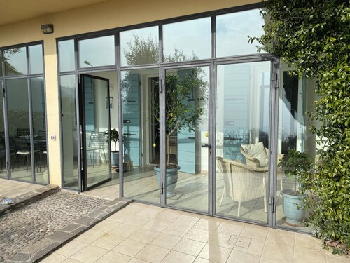 Spacious family home with pool and spectacular view of Lake Garda.