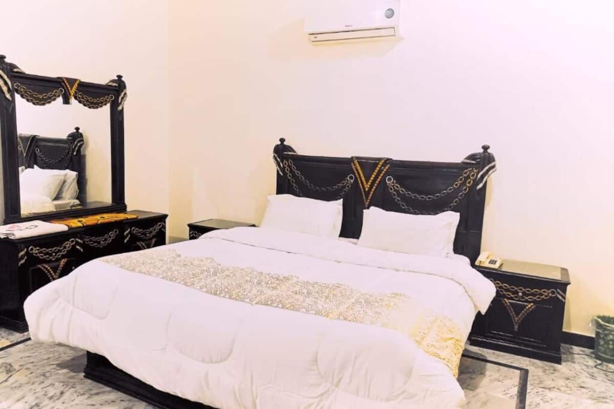 Habitación Deluxe doble | Tabla de planchar con plancha y wifi gratis