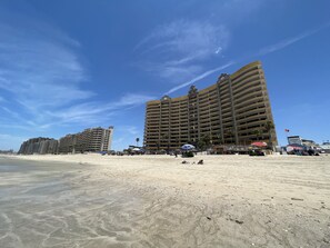 On the beach, sun loungers, beach towels
