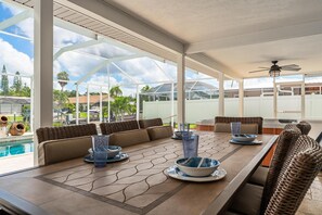 Outdoor dining - Sailboat Access minutes to River & Saltwater Pool  -Villa Otterly Amazing- Roelens Vacations (Cape Coral)