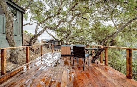 Outdoor dining. New! Soak in a Hot Tub at this Romantic Tree House Surrounded by Trees