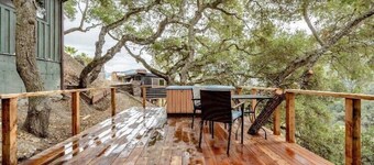 New! Soak in a Hot Tub at this Romantic Tree House Surrounded by Trees