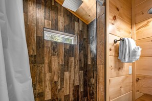 Shower, towels, soap, toilet paper