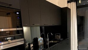Apartment, 1 Queen Bed with Sofa bed | Private kitchen | Fridge, microwave, oven, stovetop - Design Led 1bed in Cosmopolitan Queens Park (London)