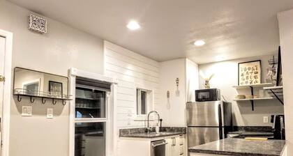 free private parking, washer dryer, back porch with a view, family friendly