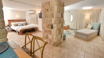 Family Cabin | Living area | 60-inch flat-screen TV with cable channels, TV