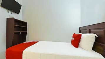 Habitación individual Deluxe | Escritorio, wifi gratis y ropa de cama