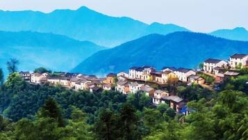 A hillside village with traditional houses.