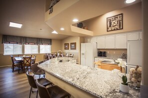 Enjoy meals in the kitchen with a dining area and window.