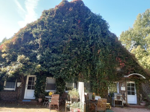 Vacation apartment surrounded by deciduous forest and pasture
