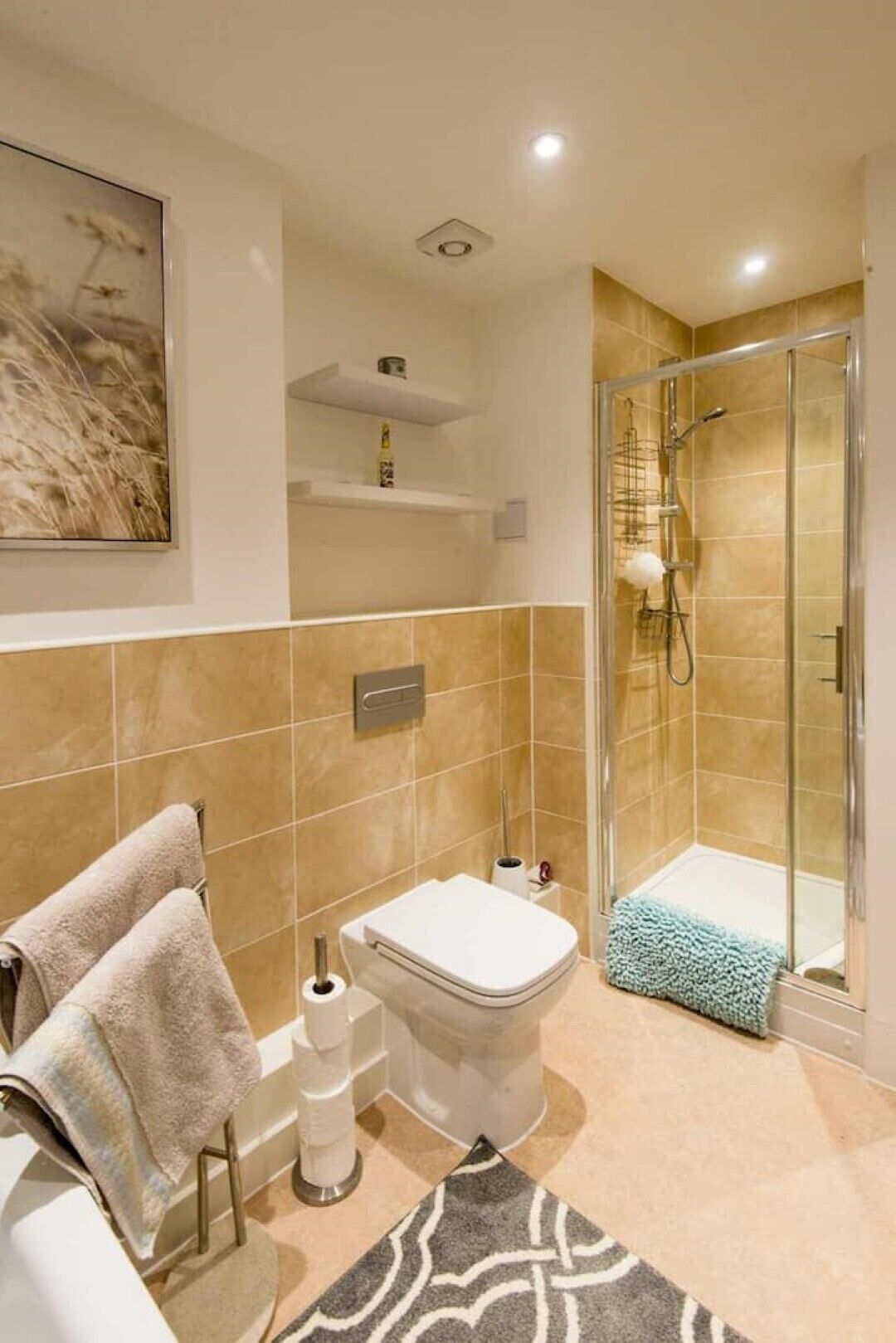 Bathtub, hair dryer, towels, soap